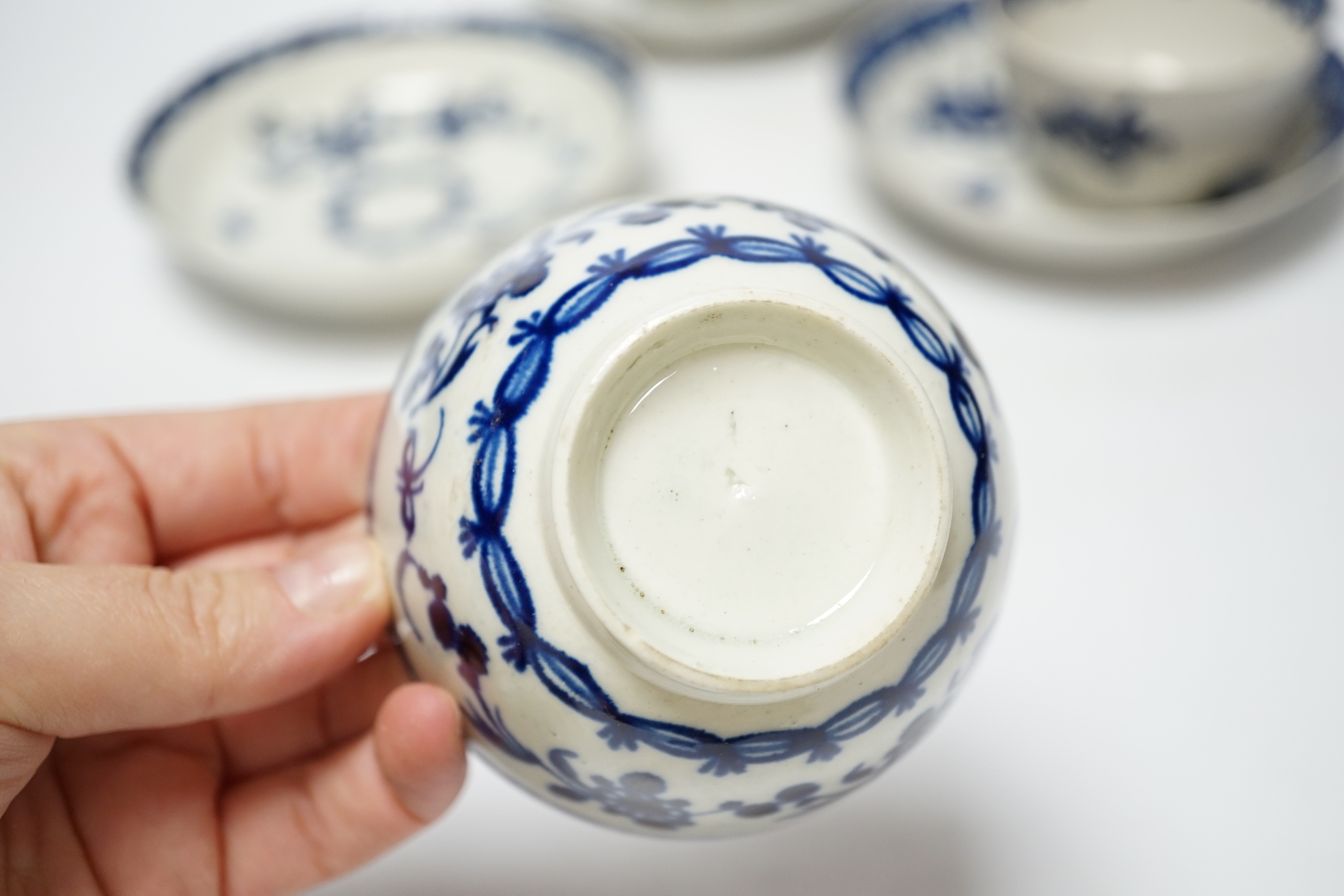Three late 18th century Liverpool blue and white teabowls and saucers